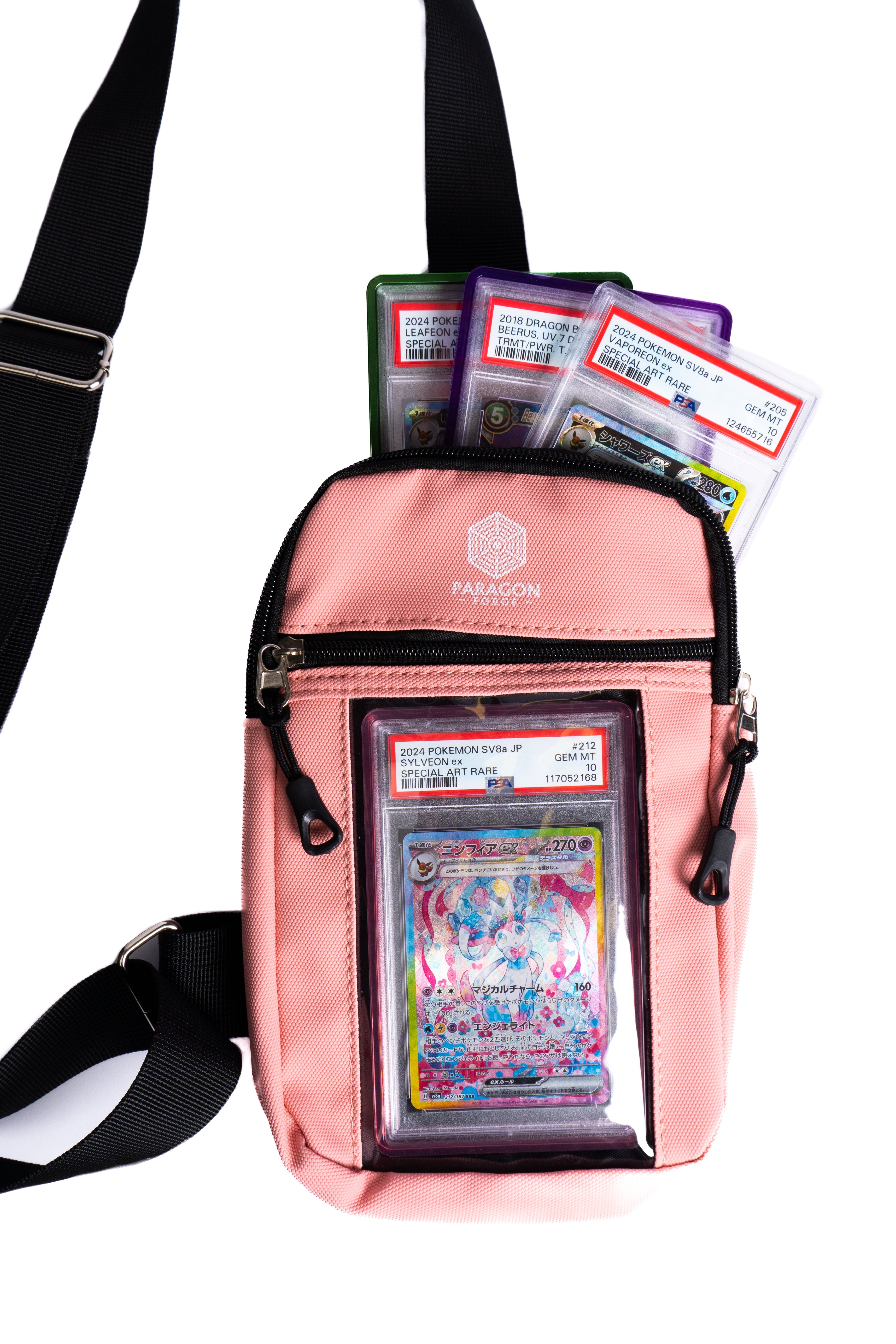 Pink crossbody TCG bag with collectible cards and a protective case on a white background